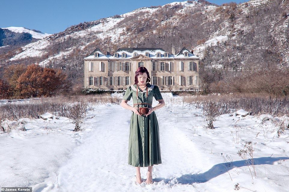Jade poses in the snow outside the the Chateau de Gudanes in the south of France. It was abandoned but has now been renovated by an Australian family 