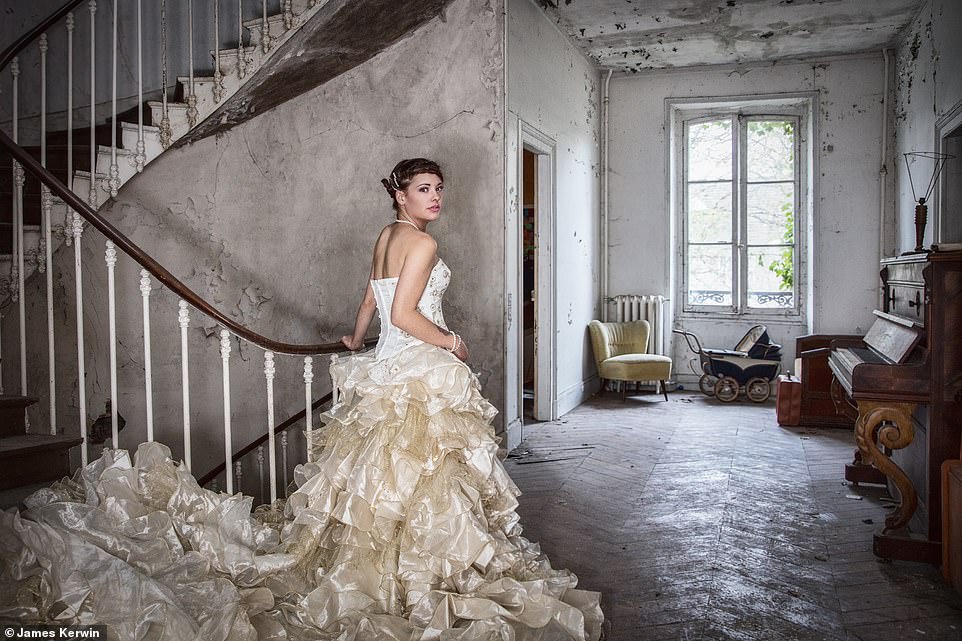 Furniture and a toy pram lay abandoned inside an empty mansion in France. Jade wore a bespoke dress for this eerie shot 