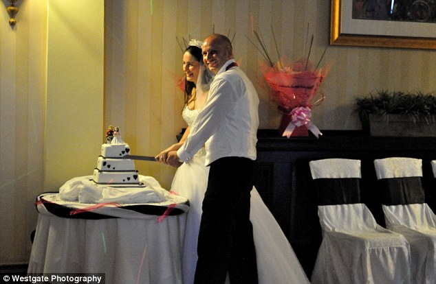 Original set: An awkward side shot of the couple cutting their wedding cake - the photo